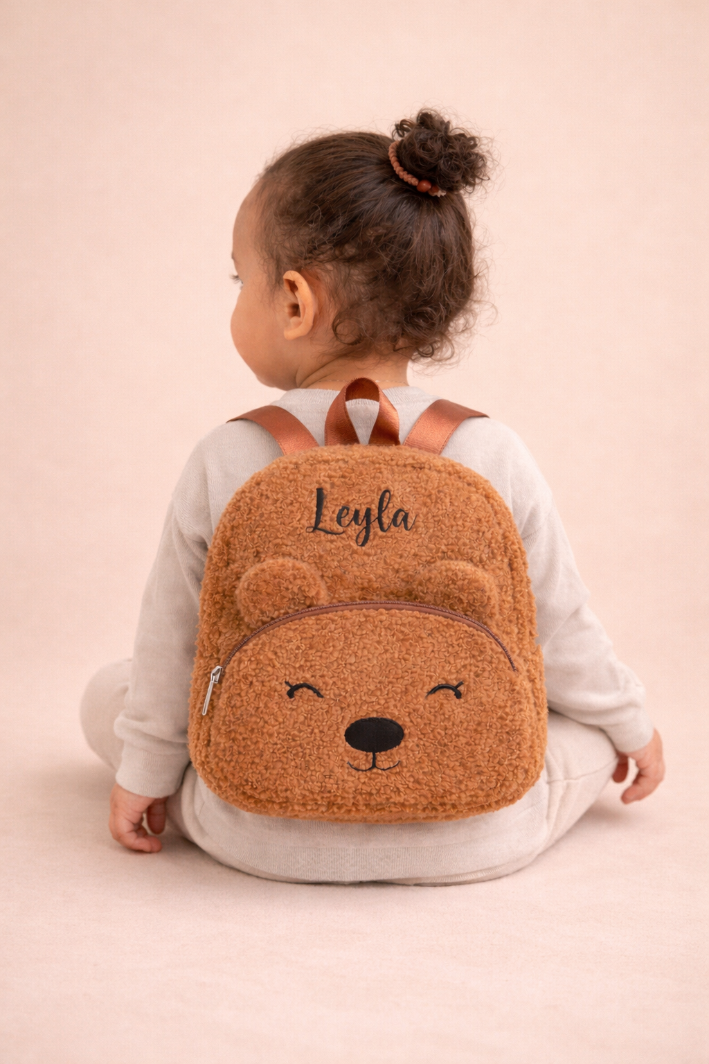Kleiner Teddyrucksack mit Gesicht - personalisierbar