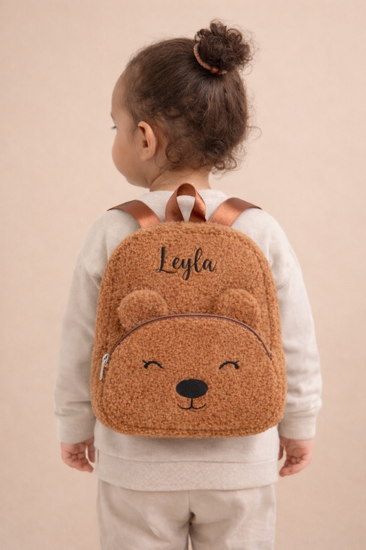 Kleiner Teddyrucksack mit Gesicht - personalisierbar