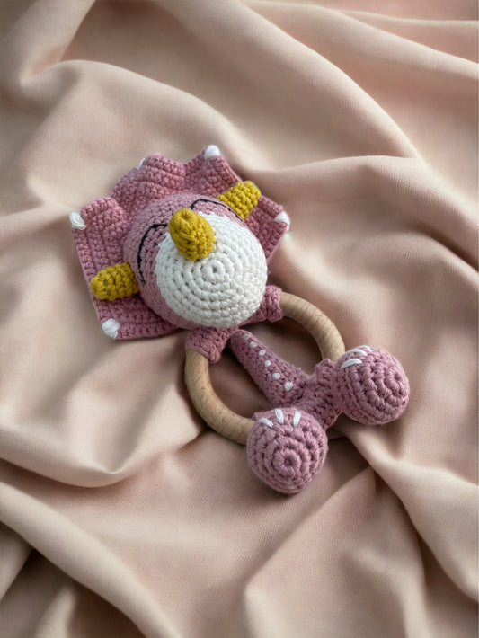 Gehäkelte Rassel - rosa Dino
